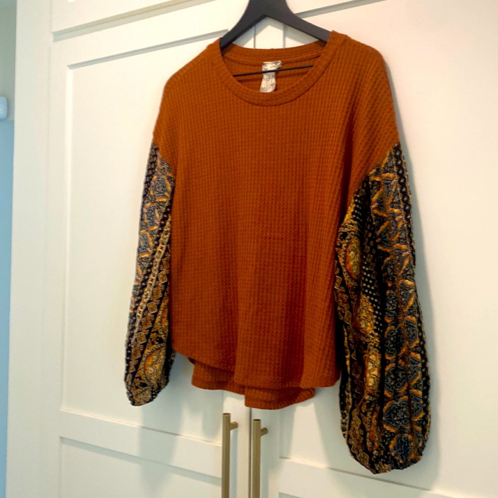 Rust waffle knit blouse with decorative sleeves size small